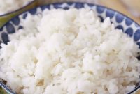 Creamy Coconut Rice with Toasted Coconut Garnish