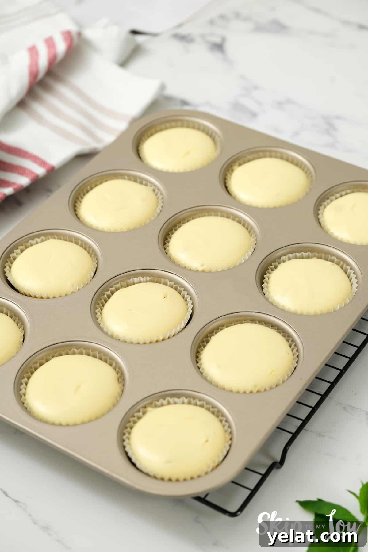 pour batter over the cooked chocolate chip cookies