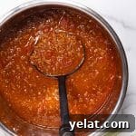 scooping texas chili from an instant pot