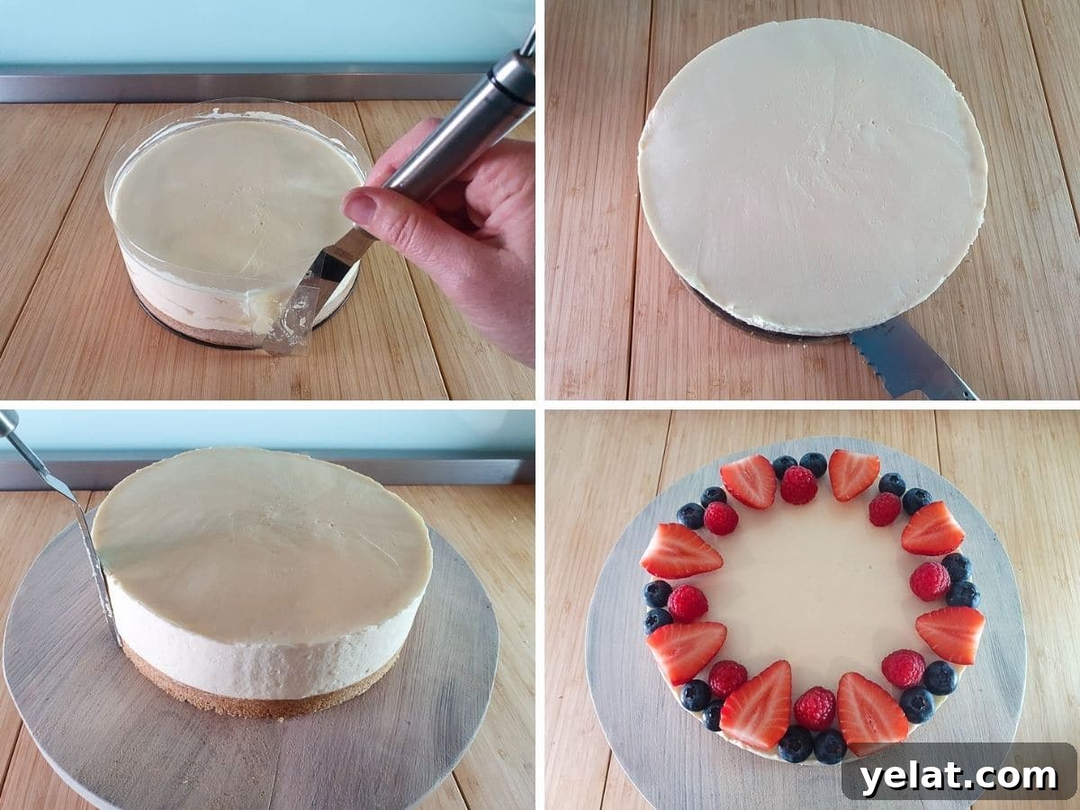 Philadelphia No-Bake Cheesecake Recipe — Creamy, Refrigerator Cheesecake 9 Removing set cake from tin, sliding knife between baking paper and take to remove from base, smoothings sides, decorating with berries.