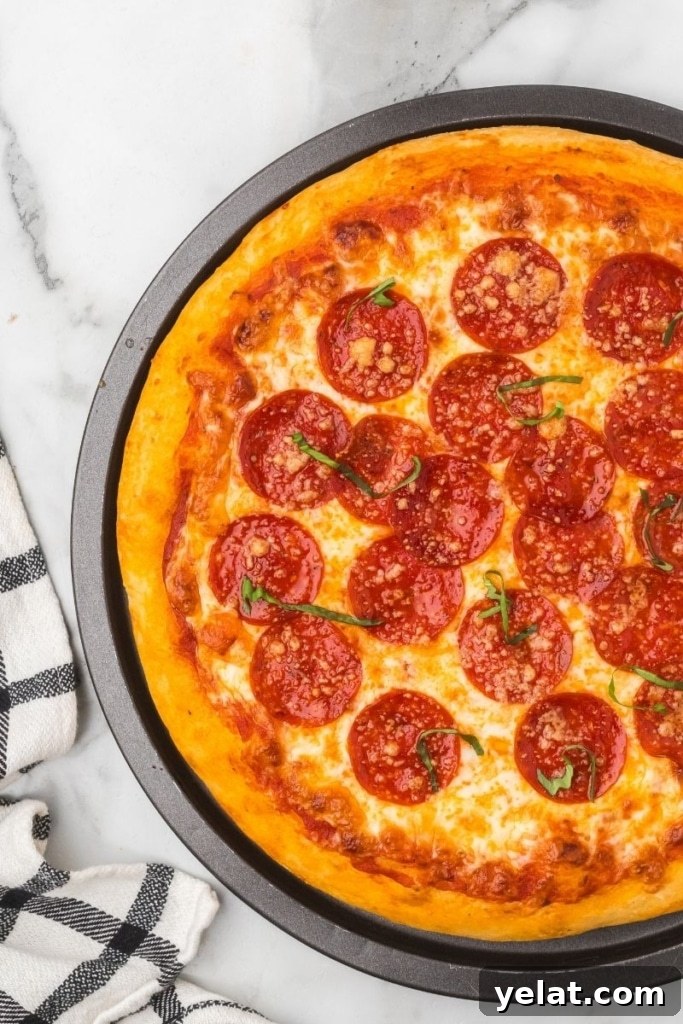 A pizza with pepperonis on top.