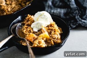 smoked apple crisp in skillet featured