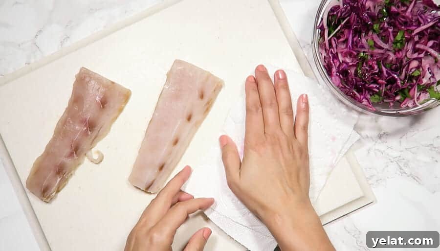 drying the mahi-mahi filets for the  blackened mahi-mahi fish tacos