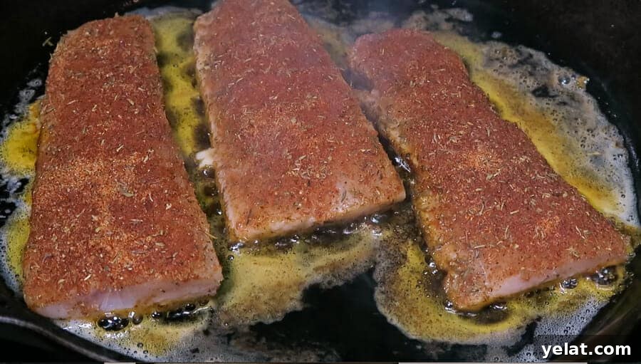 searing the filets in a cast-iron skillet for the blackened mahi-mahi fish tacos