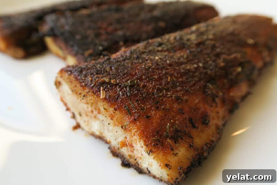 blackened mahi-mahi fish that has been seared and charred