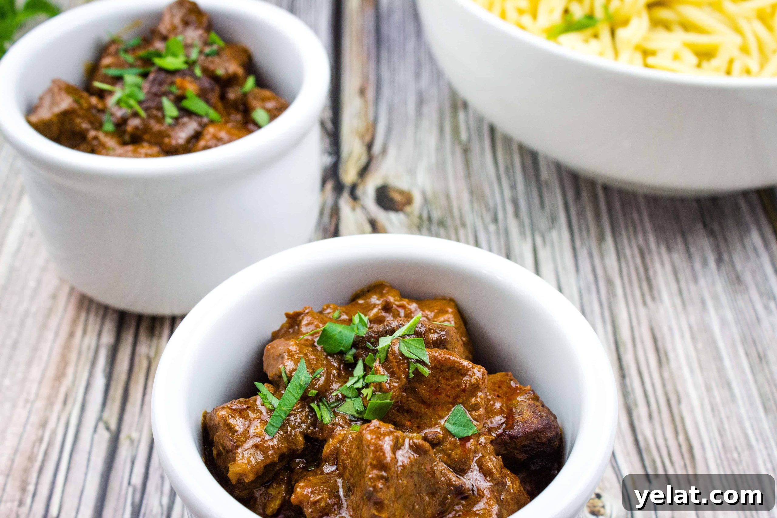 Hungarian Goulash in two white bowls.