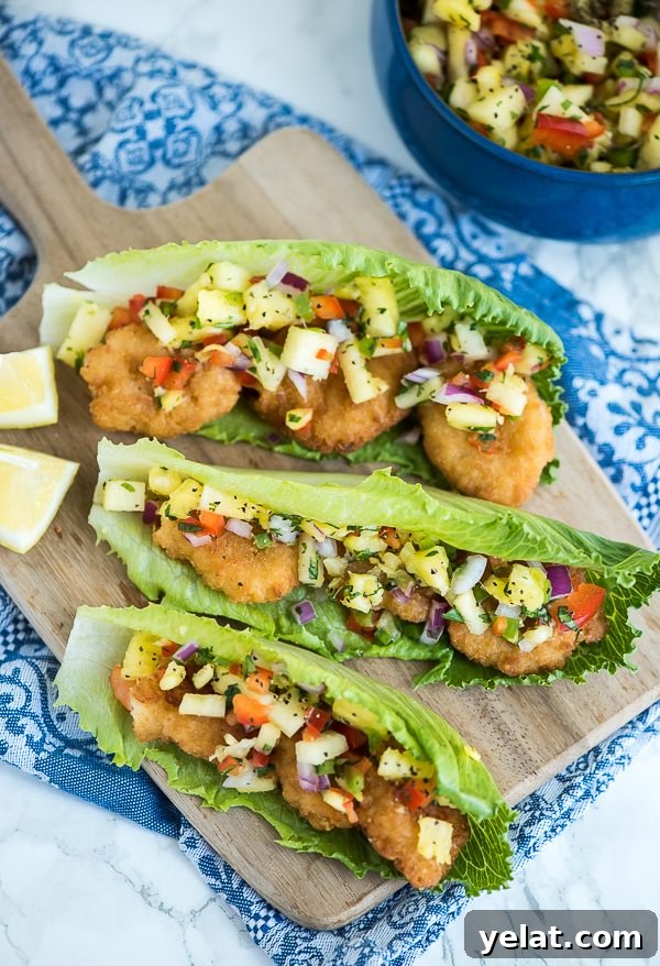 Spicy Shrimp Lettuce Wrap Recipe for Quick Weeknight Meals 3 Shrimp Lettuce Wraps topped with pineapple salsa – a quick, easy and low carb meal.