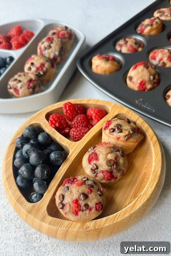 Raspberry White Chocolate Blondies Recipe — Chewy Berry Bars 8 Raspberry banana muffins served with berries.