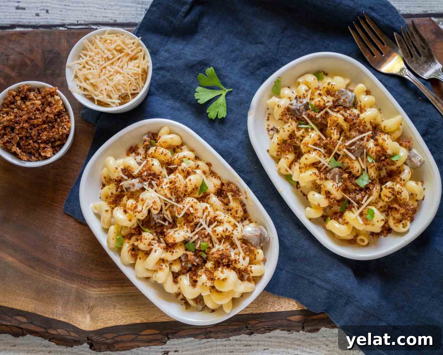 Smoky Brisket Mac and Cheese Recipe for Leftover Beef 2 Top down view of pasta with chunks of beef brisket in a cheesy cream sauce then topped with bread crumbs.