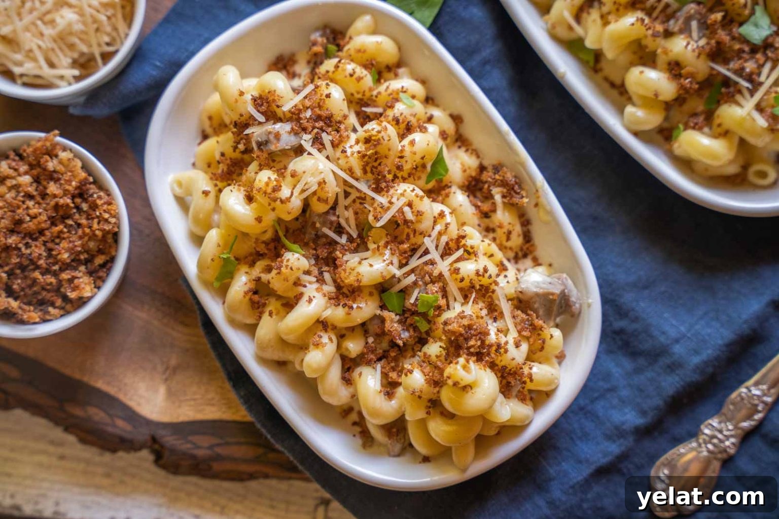 Smoky Brisket Mac and Cheese Recipe for Leftover Beef 8 Top down view of cavatappi pasta in a cheese sauce combined with chunks of brisket then topped with toasted bread crumbs.