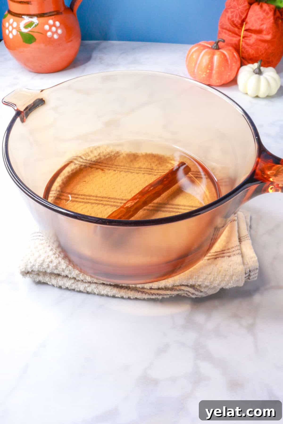 Cinnamon stick boiling in water