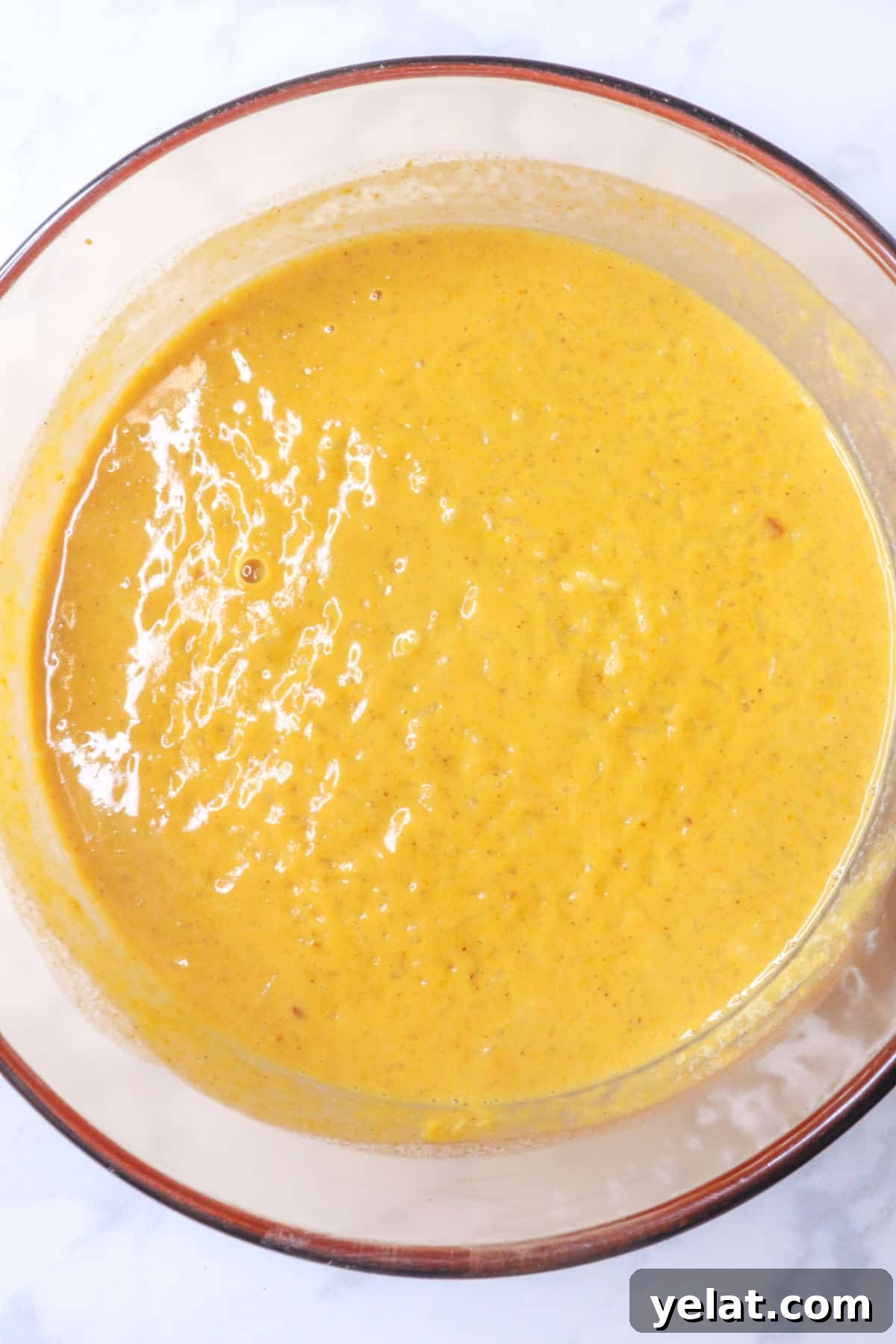 Pot with cooked pumpkin rice pudding