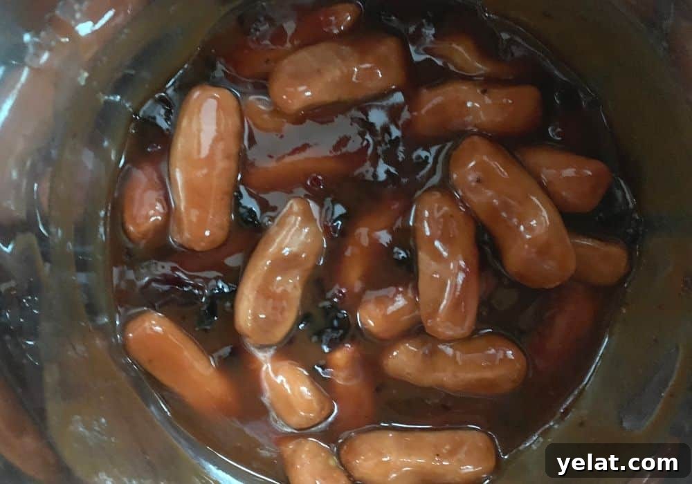 ingredients for Instant Pot little smokies mixed in the insert pot