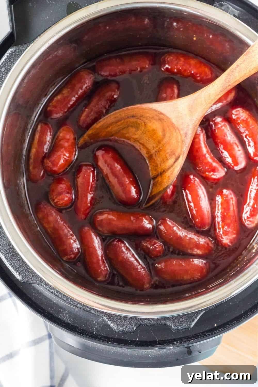 Freshly cooked Instant Pot cocktail weenies in sauce, ready to be served