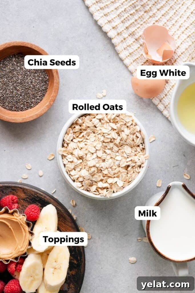 Protein Oatmeal with Egg Whites for Muscle Fuel and Satiety 3 all ingredients in egg white oatmeal including oats, milk, chia seeds, egg whites, and toppings