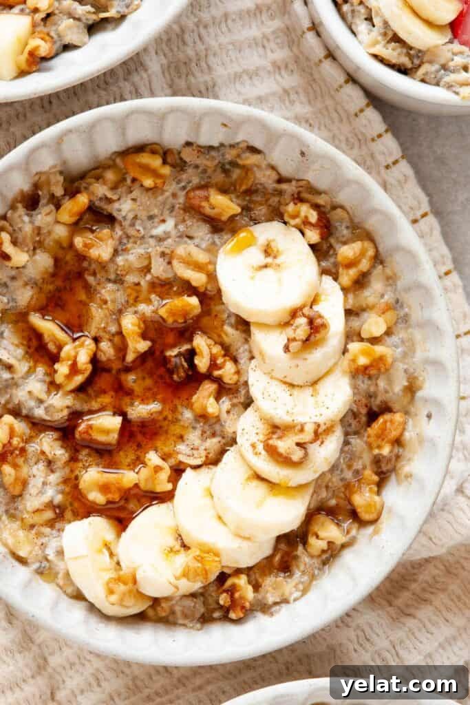 Protein Oatmeal with Egg Whites for Muscle Fuel and Satiety 6 egg white protein oatmeal in a bowl with walnuts and banana slices