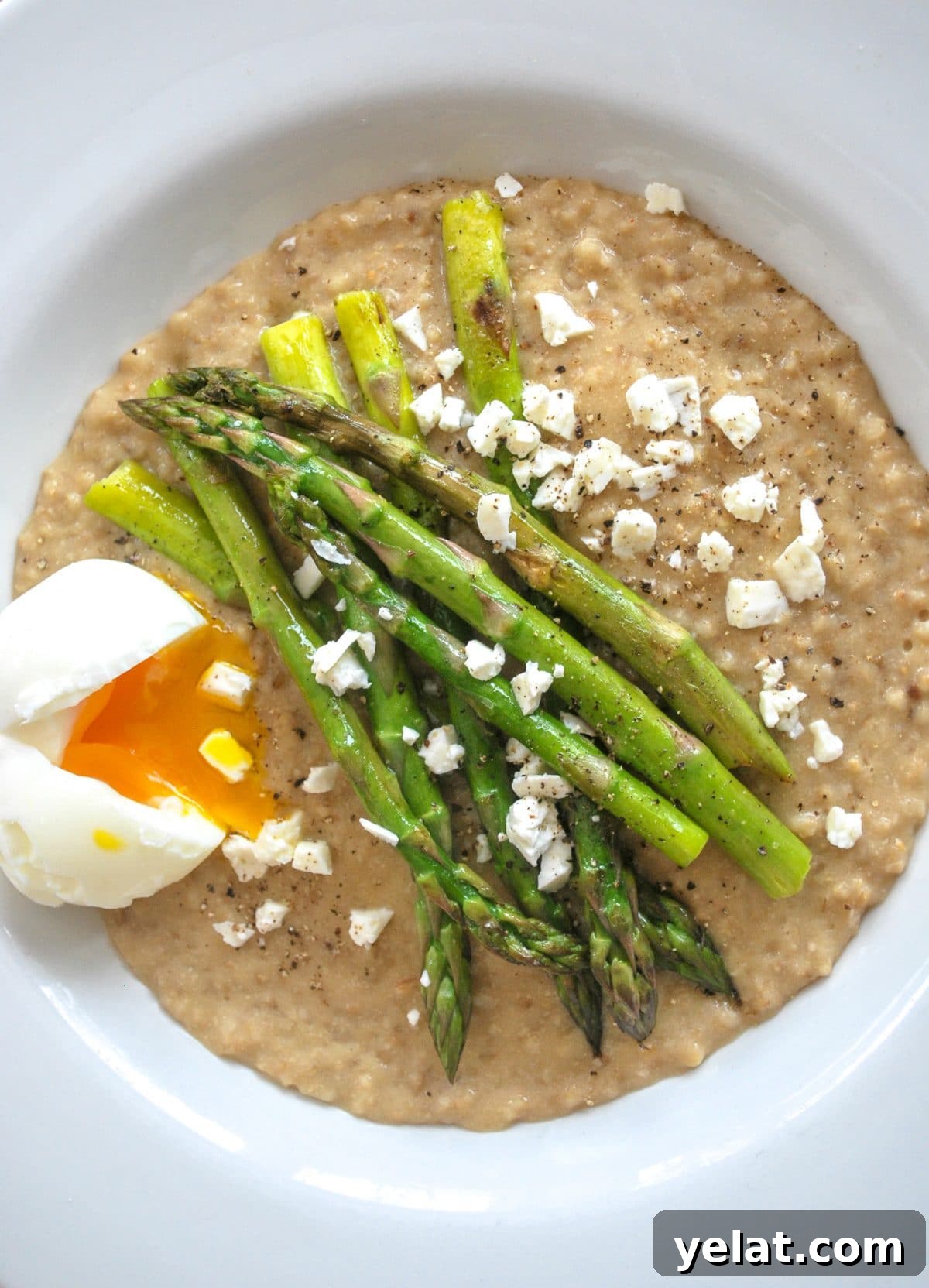 Soft-Boiled Egg and Asparagus Over Savory Oats 2 A bowl of Soft Boiled and and Asparagus on steel cut oats