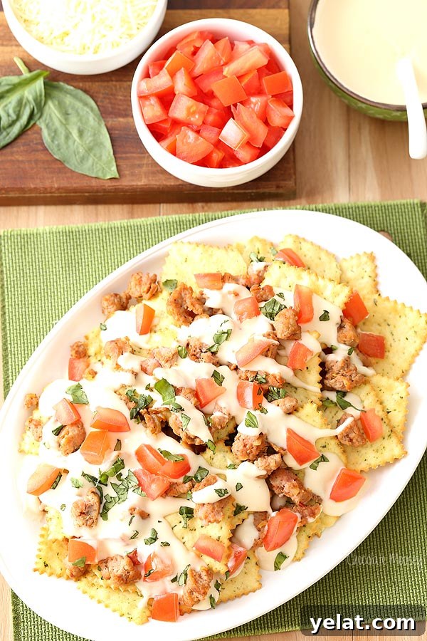 Italian Nachos: Crispy Waffle Fries with Mozzarella & Marinara 2 Italian Nachos with hot sausage, mozzarella cheese, tomatoes, basil, and Pasta Chips