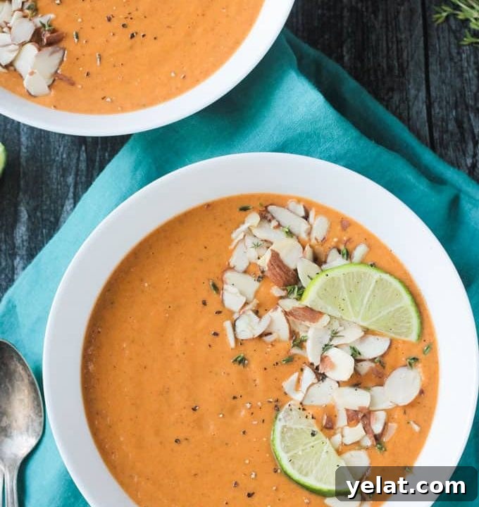 Comforting Vegan Soup Recipes to Warm Your Weeknight Meals 7 Overhead view of a sweet potato soup recipe in a white bowl.