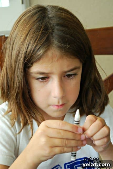 DIY Halloween Crayons: Step-by-Step Guide for Festive Shapes 4 child peeling crayons