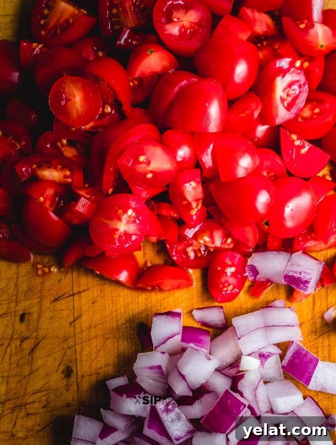 Chopped tomatoes and onions Chopped tomatoes and red onions.