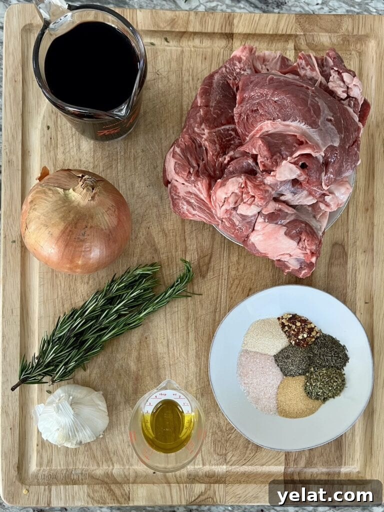 Slow-Roasted Mediterranean Lamb Shoulder Recipe 4 All recipe ingredients on cutting board.