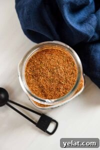 15 Homemade Seasoning Recipes to Transform Your Cooking 11 fajita spices in a mason jar open on top