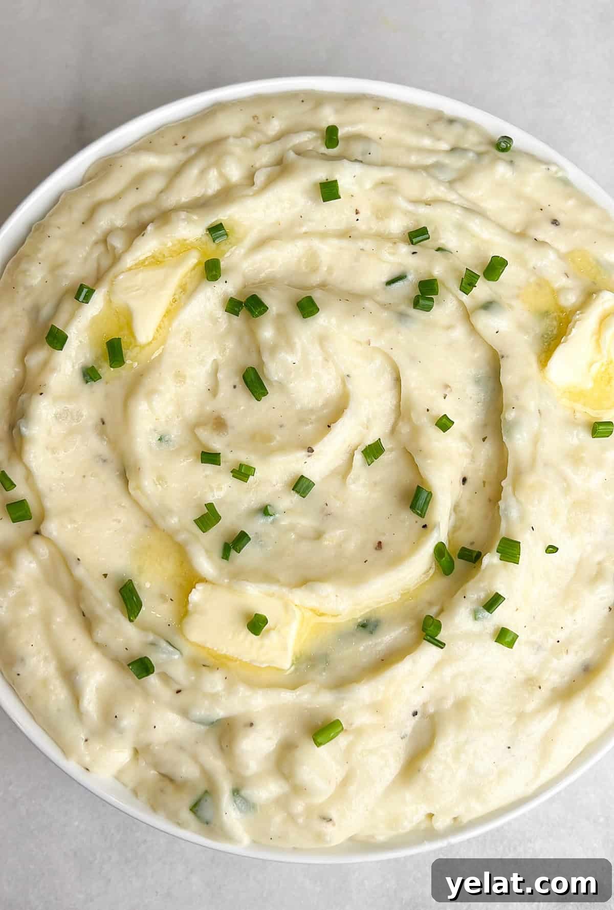 Close overhead view of a bowl of Boursin mashed potatoes