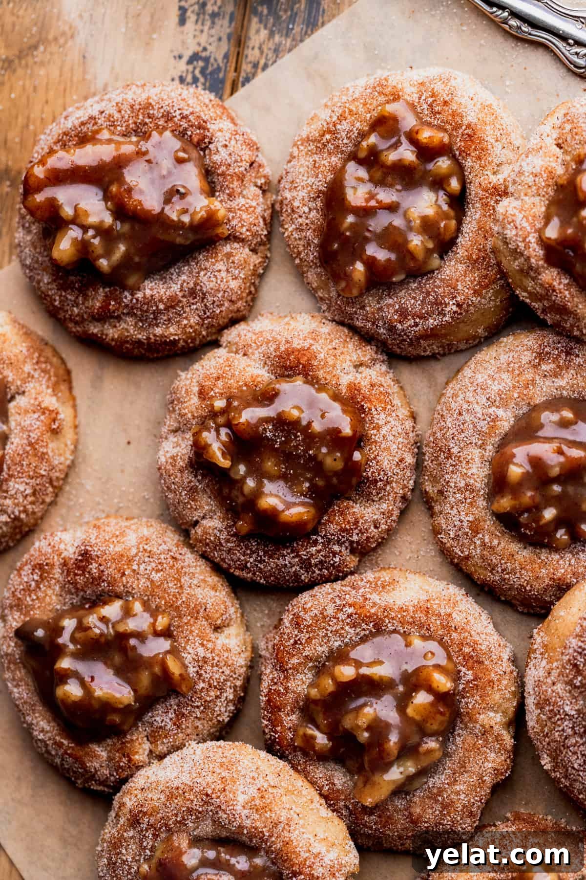Pecan Pie Cookie Recipe: Crispy, Gooey Mini Pies 2 Pecan pie cookies coated in cinnamon sugar.