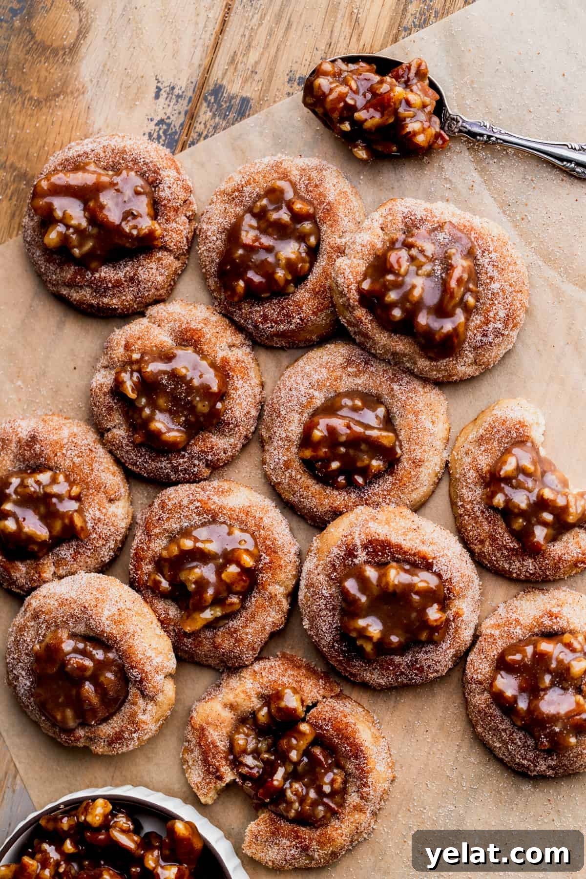 Pecan Pie Cookie Recipe: Crispy, Gooey Mini Pies 11 Top view of pecan pie cookies filled with pecan pie filling.