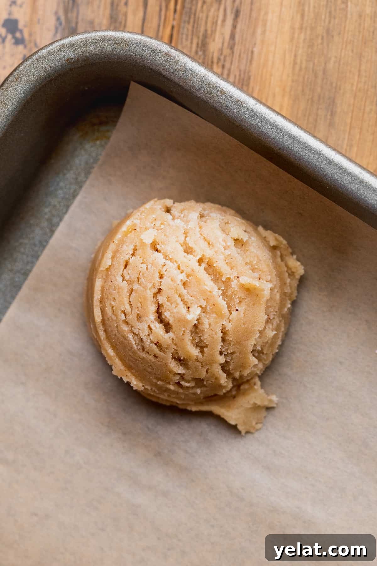 Pecan Pie Cookie Recipe: Crispy, Gooey Mini Pies 6 Cookie dough ball on a cookie sheet.
