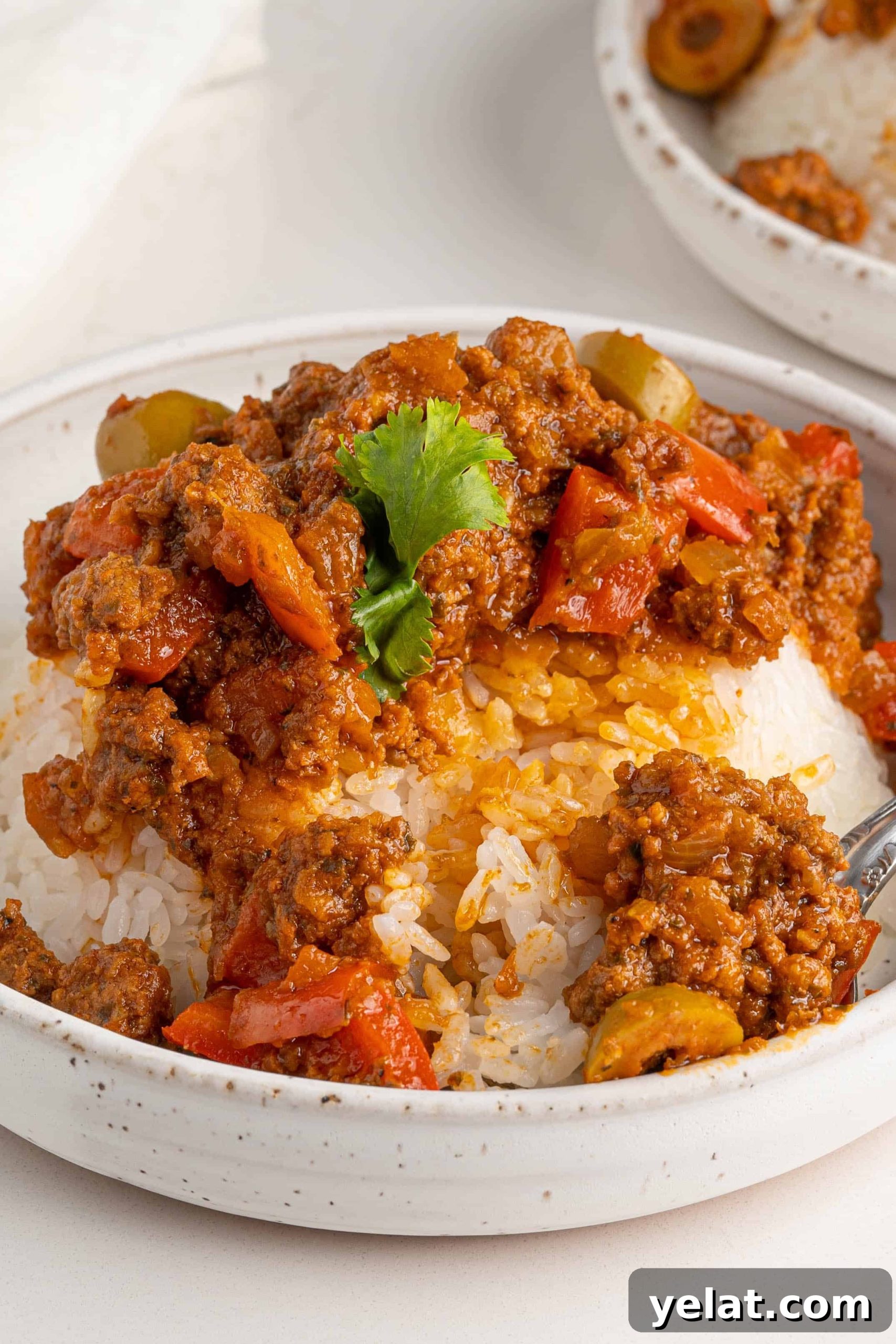 picadillo in bowls on a white table