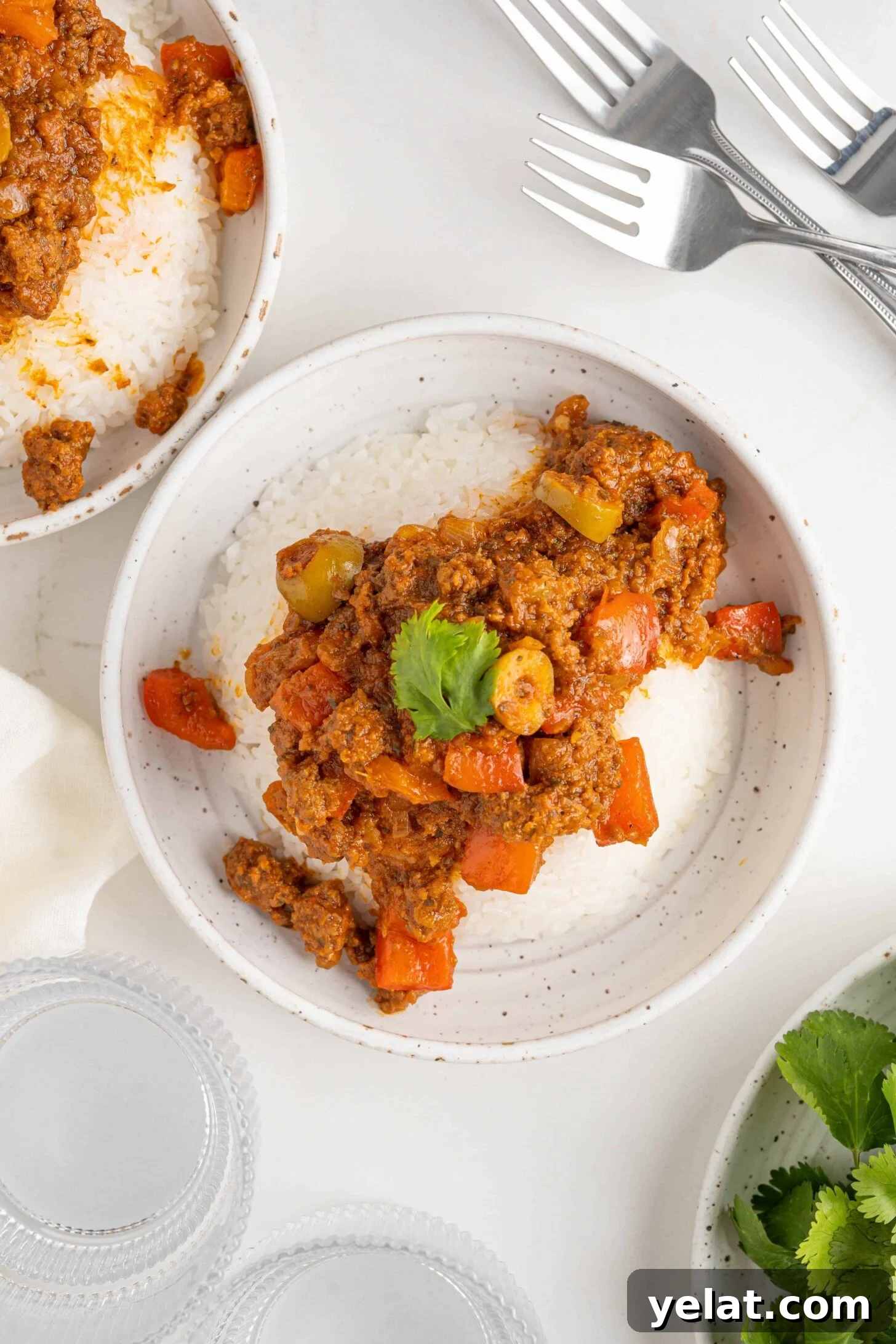 picadillo in bowls on a white table