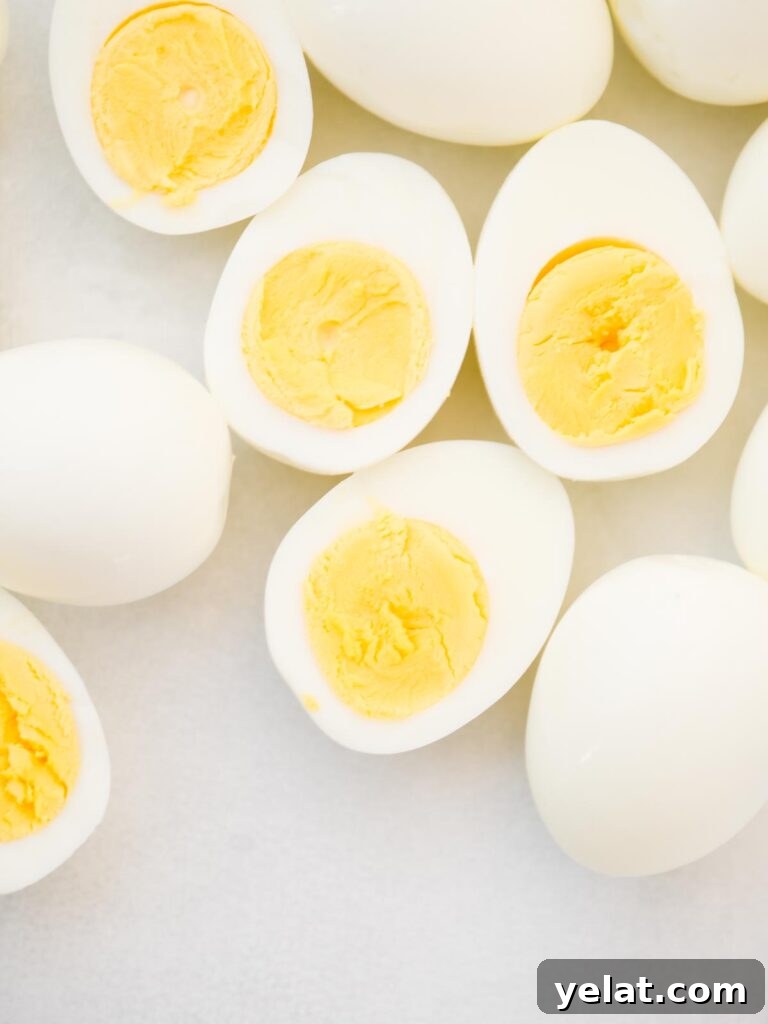 Creamy Deviled Eggs with Dijon Mustard and Fresh Herbs 4 Halved hard boiled eggs.