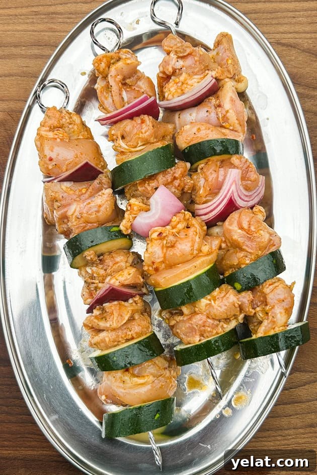 Grilled Pepperoncini Chicken Kabobs with Spicy Yogurt Sauce & Maroulosalata 4 Marinated Spicy Chicken Kebobs ready for the grill