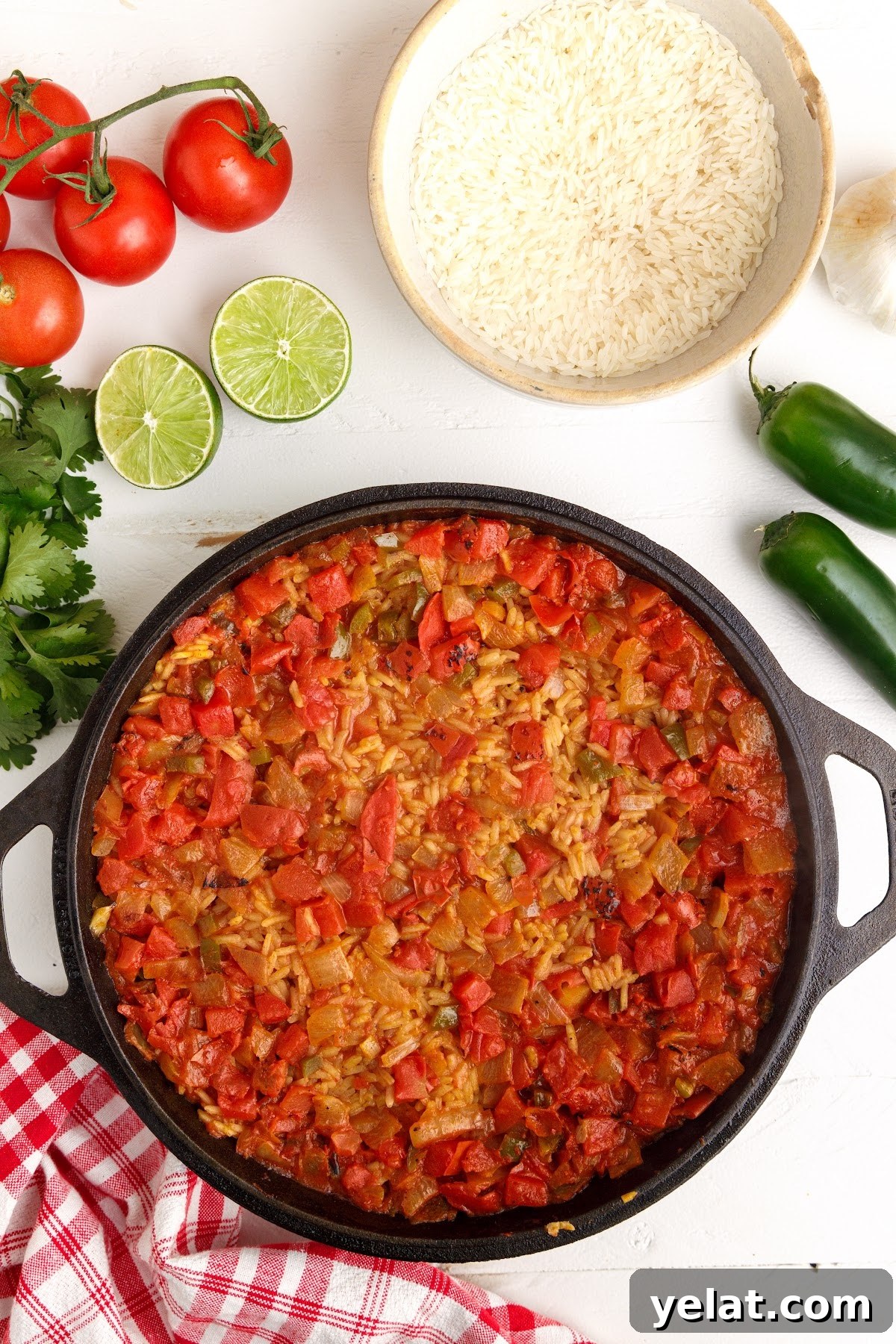 Authentic Mexican Red Rice Recipe: Fluffy, Flavorful Arroz Roja 7 Bringing all ingredients to a boil and then a simmer in a pot.