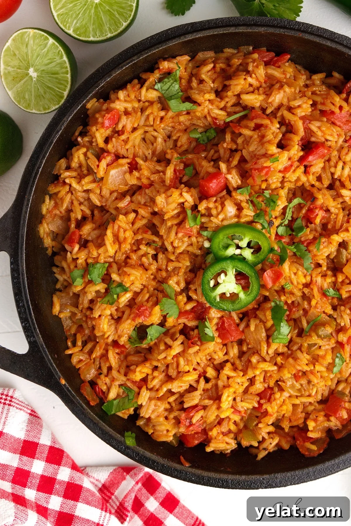 Authentic Mexican Red Rice Recipe: Fluffy, Flavorful Arroz Roja 8 Pan of cooked Mexican Red Rice ready to serve and eat.