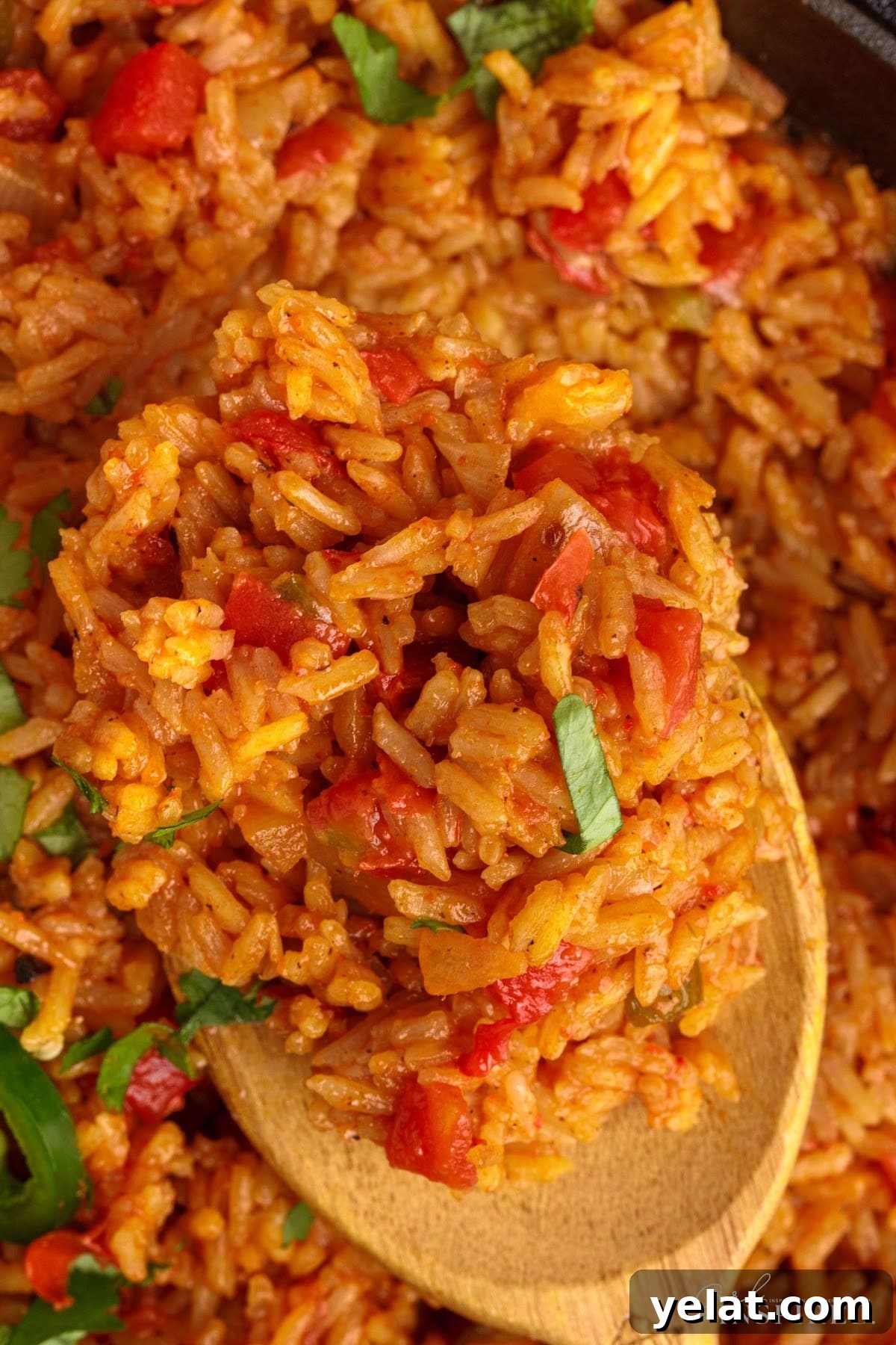 Authentic Mexican Red Rice Recipe: Fluffy, Flavorful Arroz Roja 9 Pan of cooked Mexican Red Rice ready to serve and eat.