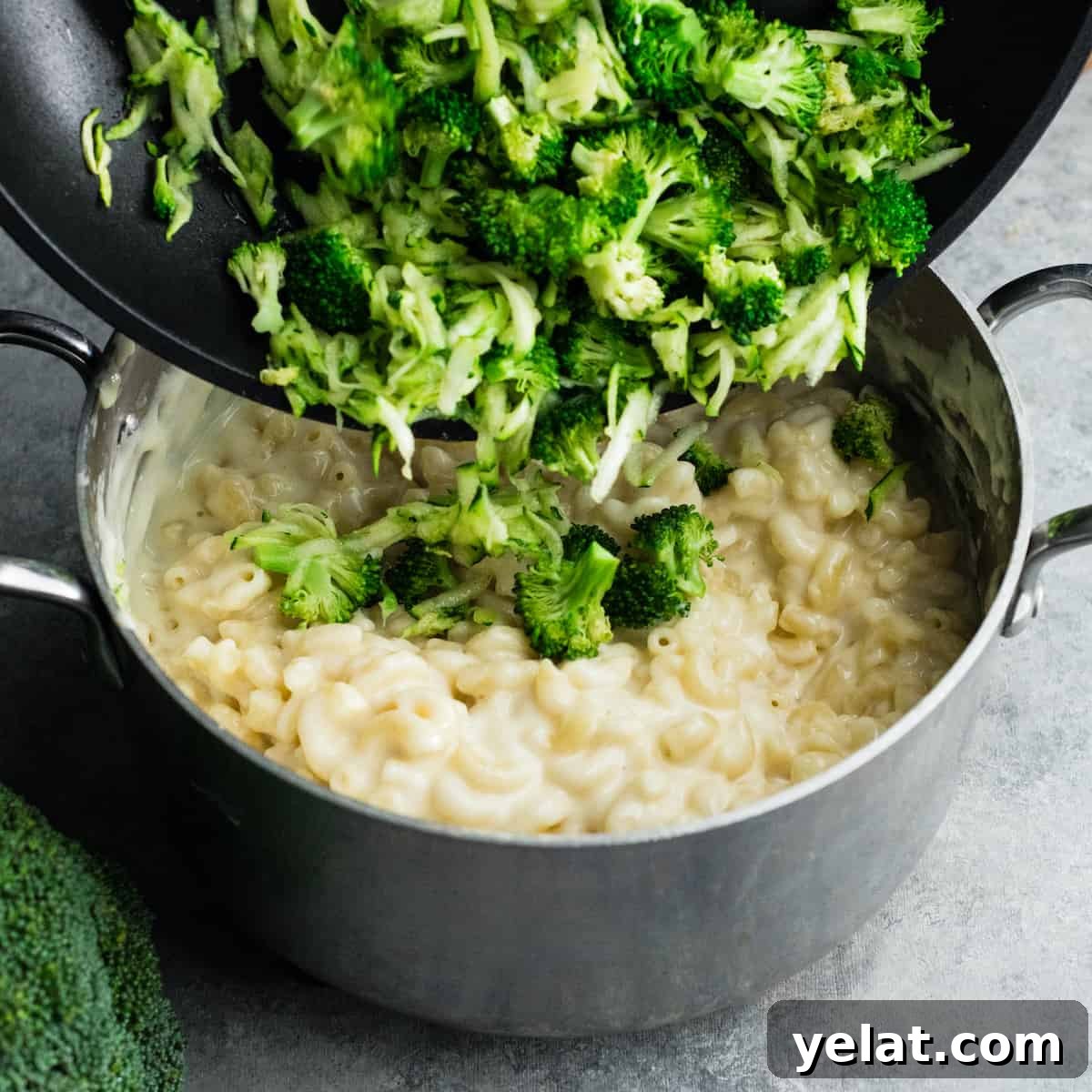 front view of veggies being added to vegetable mac and cheese 