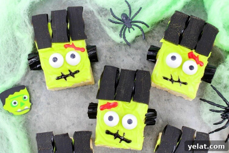Frankenstein Monster Rice Krispies Treats on green spider webs.