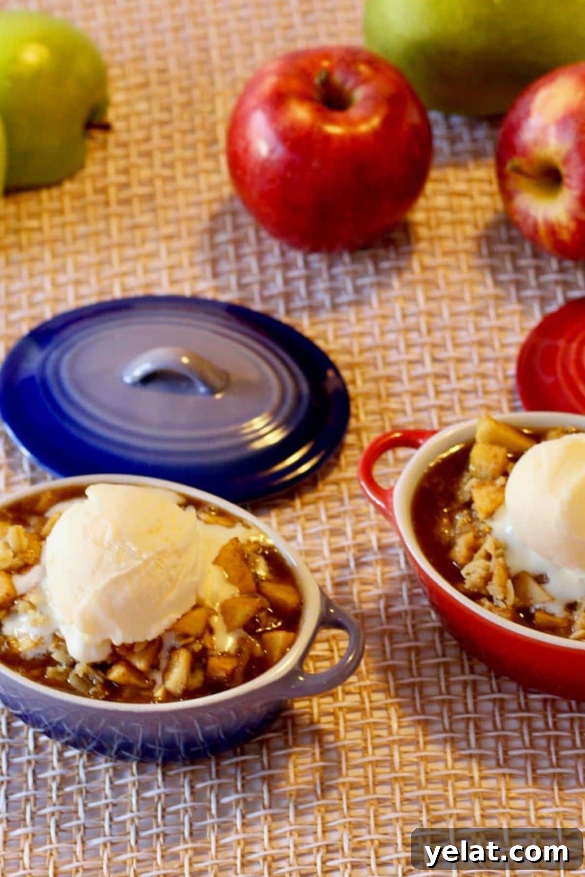 Apple and Pear Crumble topped with ice cream.