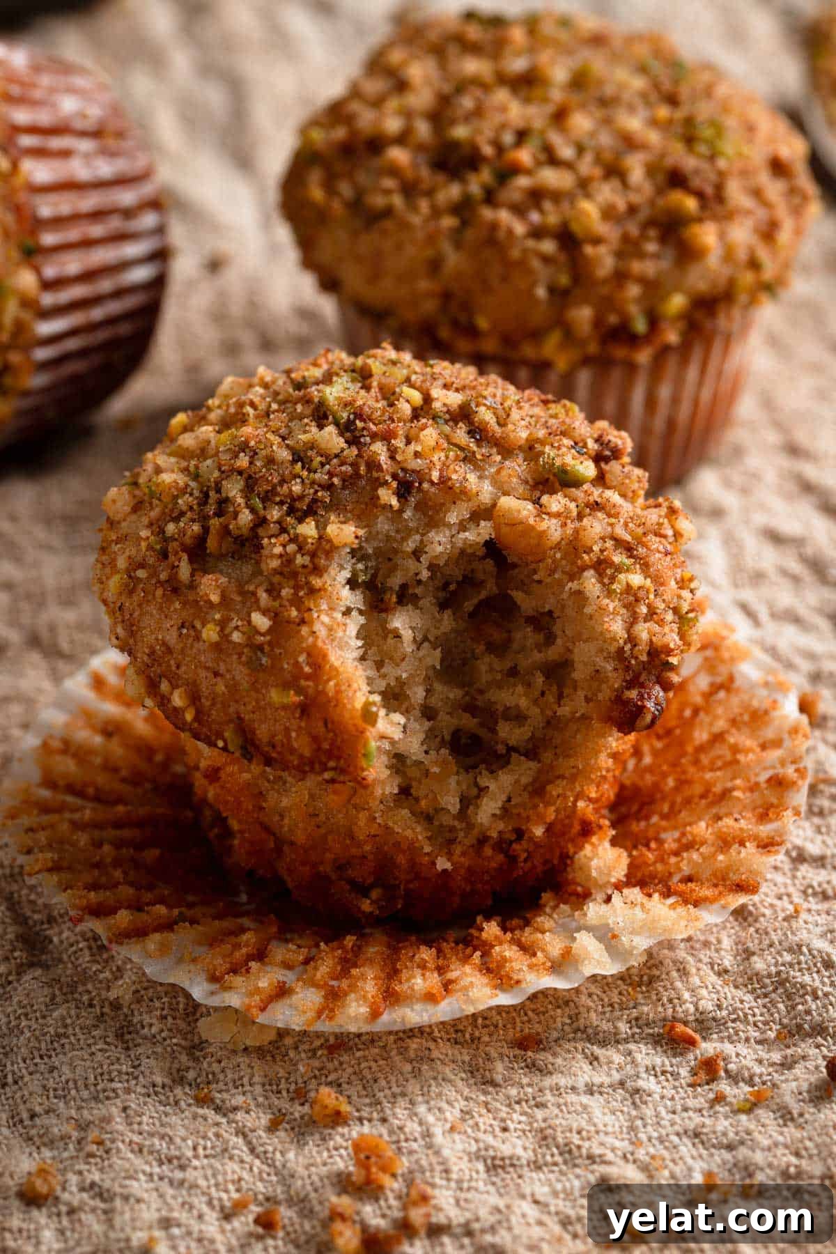 Baklava Muffins: Mediterranean Dessert with Honey, Nuts & Phyllo 2 A Baklava muffin topped with nuts.