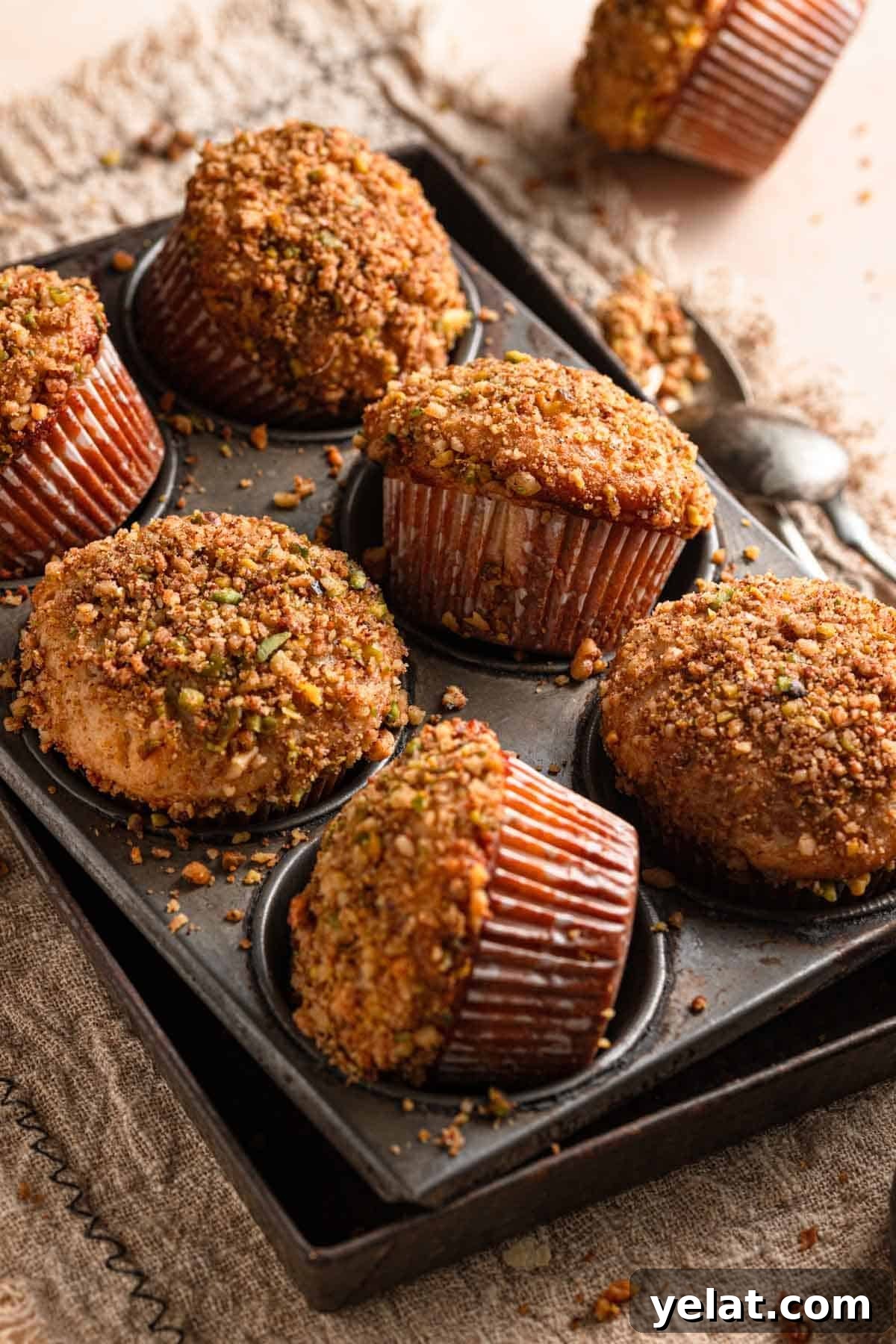Baklava Muffins: Mediterranean Dessert with Honey, Nuts & Phyllo 10 baklava muffins in a tin.