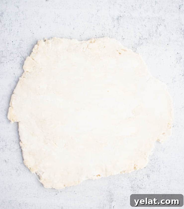 Flaky Pie Crust Recipe: A Complete Step-by-Step Guide 6 Pie dough rolled into a rectangle.