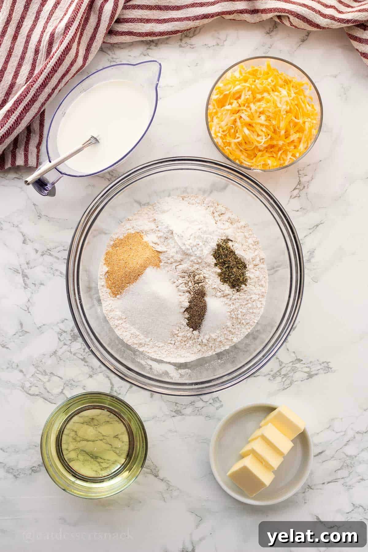 Garlic Cheddar Drop Biscuits Recipe: Quick Savory Biscuits 5 Dry ingredients for garlic cheddar drop biscuits in glass bowl.