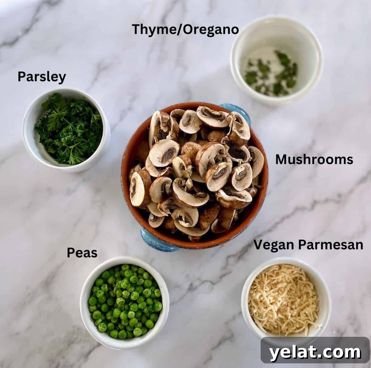 Creamy Roasted Red Pepper Pasta with Parmesan and Basil 4 Optional ingredients in bowls on the table: mushrooms, vegan parmesan cheese, peas, parsley, thyme and oregano