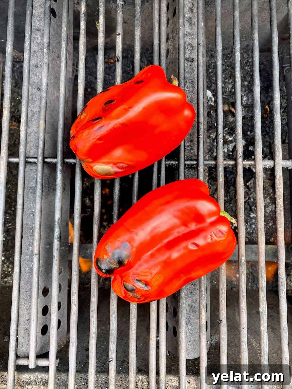 Creamy Roasted Red Pepper Pasta with Parmesan and Basil 5 roasting red peppers on a grill