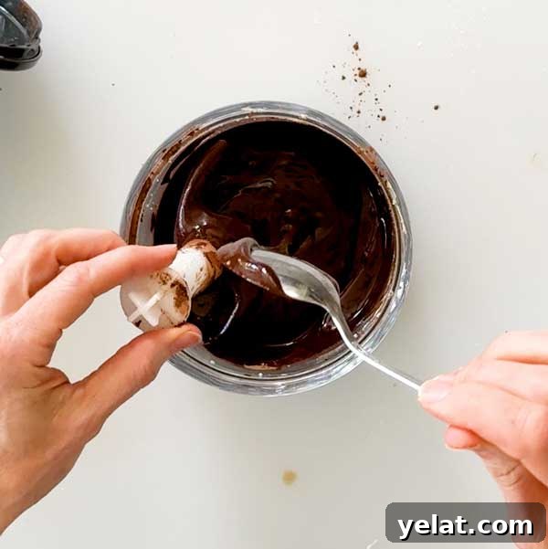 Light Protein Cottage Cheese with Chocolate Sauce Recipe 6 Mixing chocolate sauce in a chopper cup.