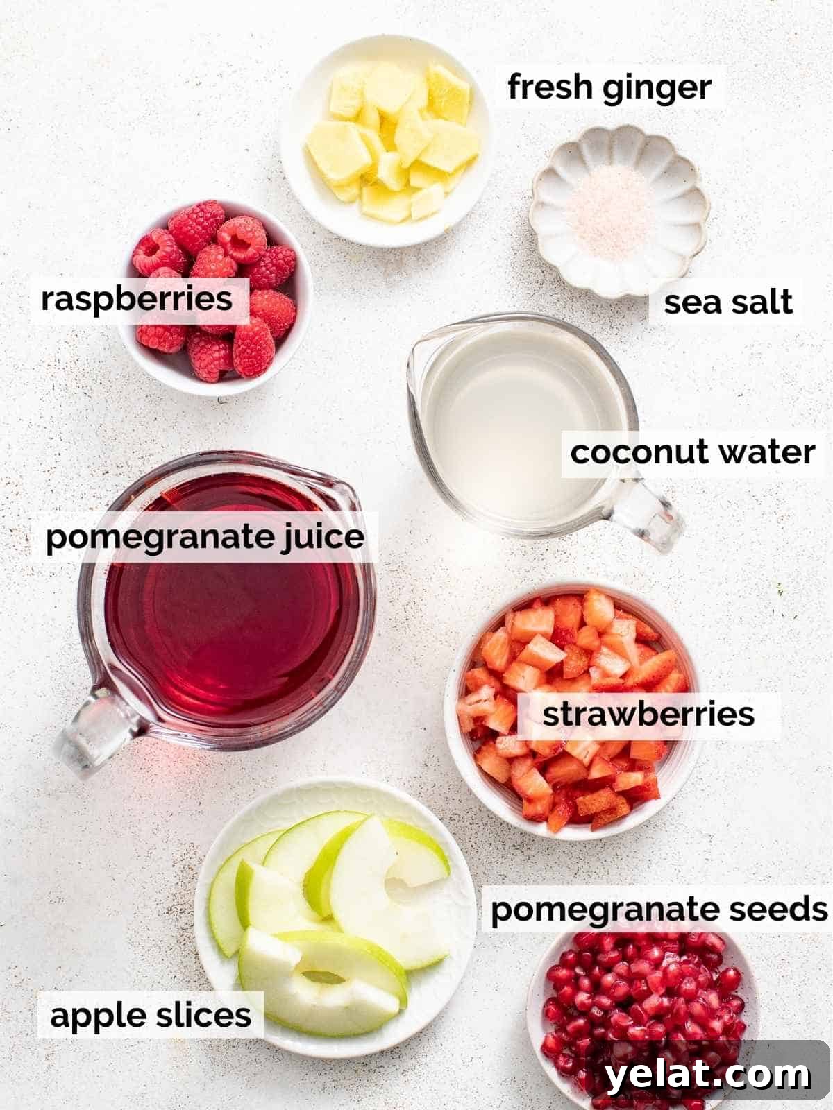 Pomegranate Virgin Sangria Recipe — Refreshing Party Drink 3 Ingredients for non-alcoholic sangria with pomegranate on a white background.