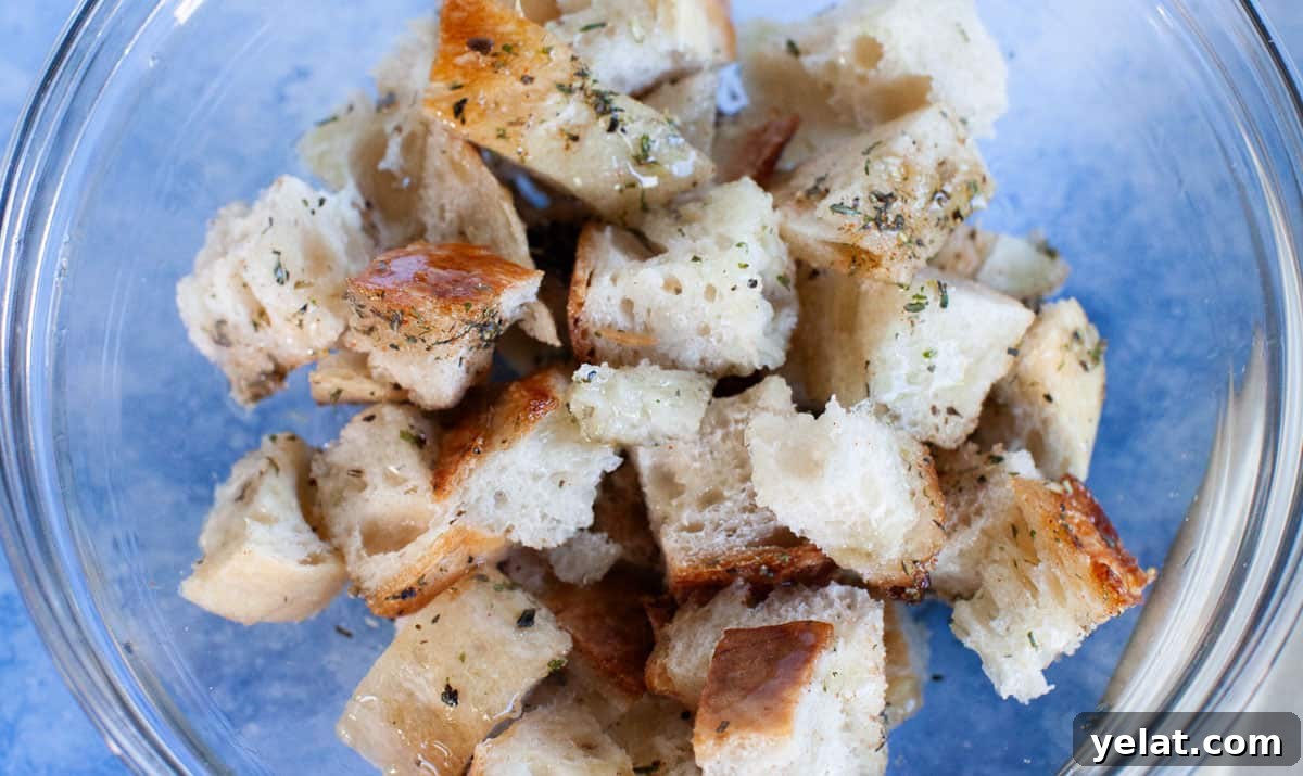 Crispy Homemade Croutons: Simple Recipe for Perfect Salads 4 Homemade croutons in a glass bowl.